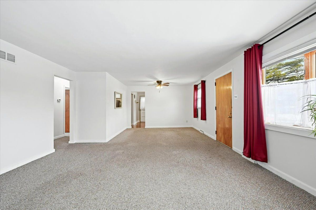 Living Room looking into Dining Room and Kitchen